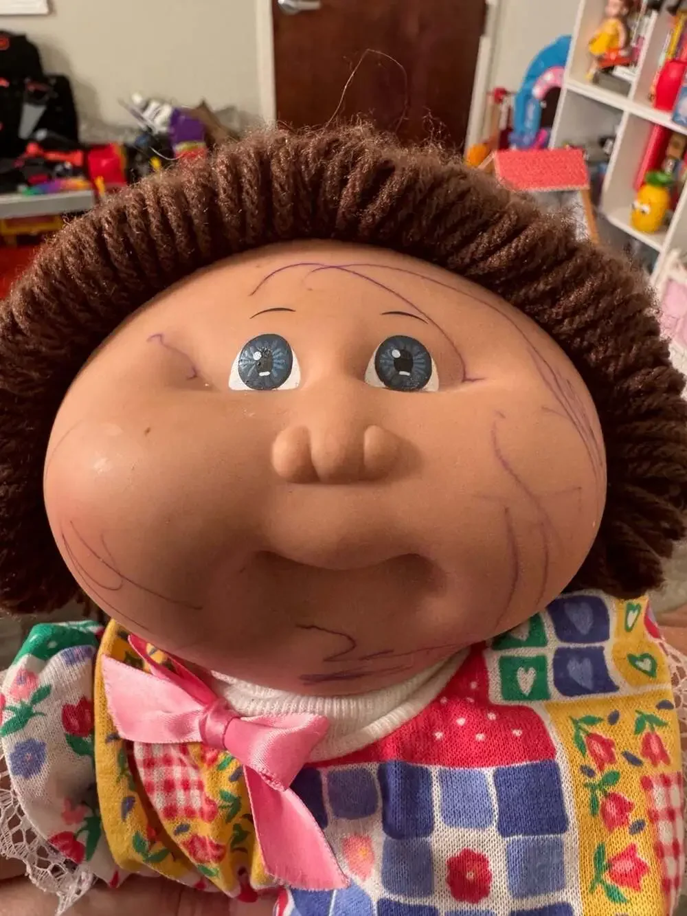 Vintage Cabbage Patch Kids Doll with Brown Yarn Hair and Quilted Patchwork Outfi